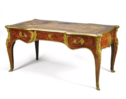 A FRENCH ORMOLU-MOUNTED TULIPWOOD AND KINGWOOD MARQUETRY BUREAU PLAT