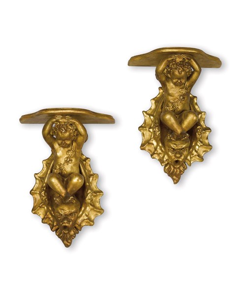 A PAIR OF ITALIAN CARVED AND GILTWOOD WALL BRACKETS