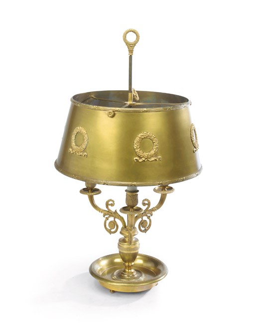 A FRENCH ORMOLU AND TOLE THREE-LIGHT LAMPE BOUILLOTTE