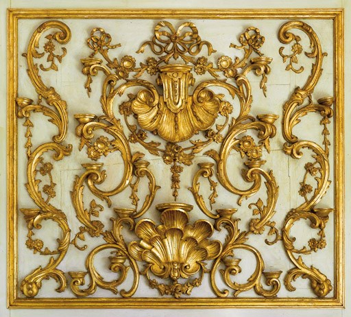 A SOUTH ITALIAN CARVED, GILT VARNISHED SILVERED (MECCA) AND GREEN-PAINTED OVERMANTEL PANEL