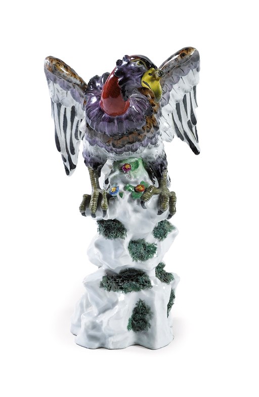 A CONTINENTAL PORCELAIN MODEL OF A VULTURE