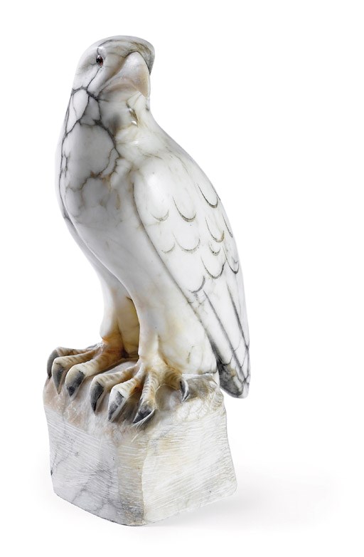 A GREY-VEINED WHITE MARBLE CARVED MODEL OF AN EAGLE