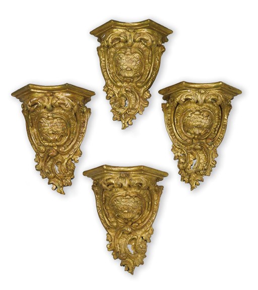 A SET OF FOUR NORTH ITALIAN GILTWOOD WALL-BRACKETS