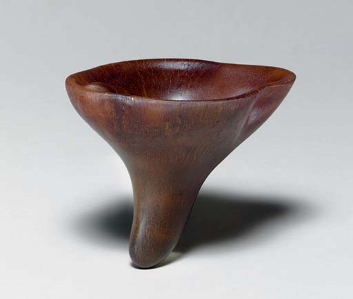 **AN UNUSUAL PLAIN RHINOCEROS HORN LIBATION CUP