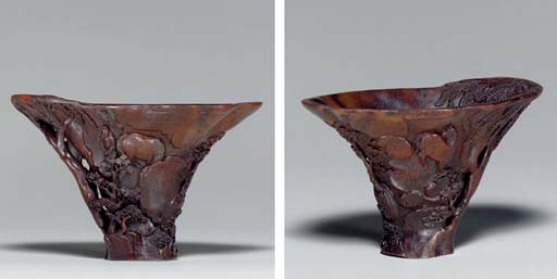 **AN UNUSUAL RHINOCEROS HORN LIBATION CUP