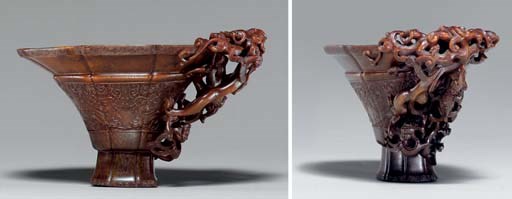 **A FINELY CARVED ARCHAISTIC RHINOCEROS HORN LIBATION CUP