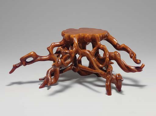 AN UNUSUAL BOXWOOD DISPLAY STAND