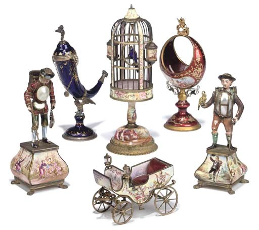A COLLECTION OF AUSTRIAN SILVER AND SILVER-GILT-MOUNTED ENAMELLED MINIATURE OBJECTS