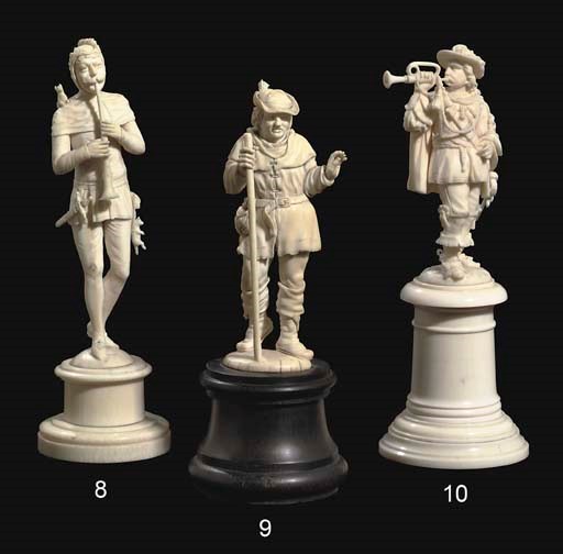 A GERMAN CARVED IVORY FIGURE OF THE PIED PIPER OF HAMLIN
