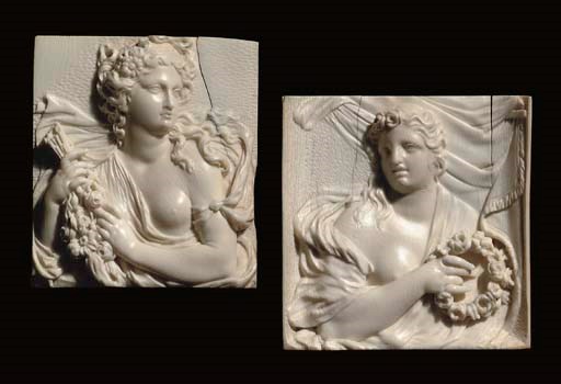 A PAIR OF CARVED IVORY BAS-RELIEFS OF MAIDENS