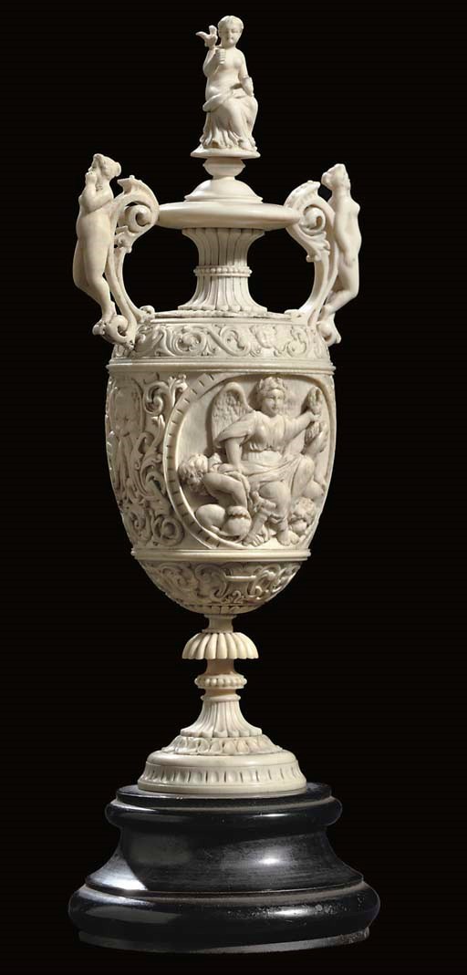 A GERMAN CARVED IVORY VASE AND COVER