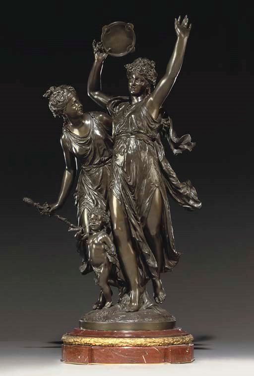 A FRENCH BRONZE GROUP OF TWO DANCING BACCHANTES AND A PUTTO