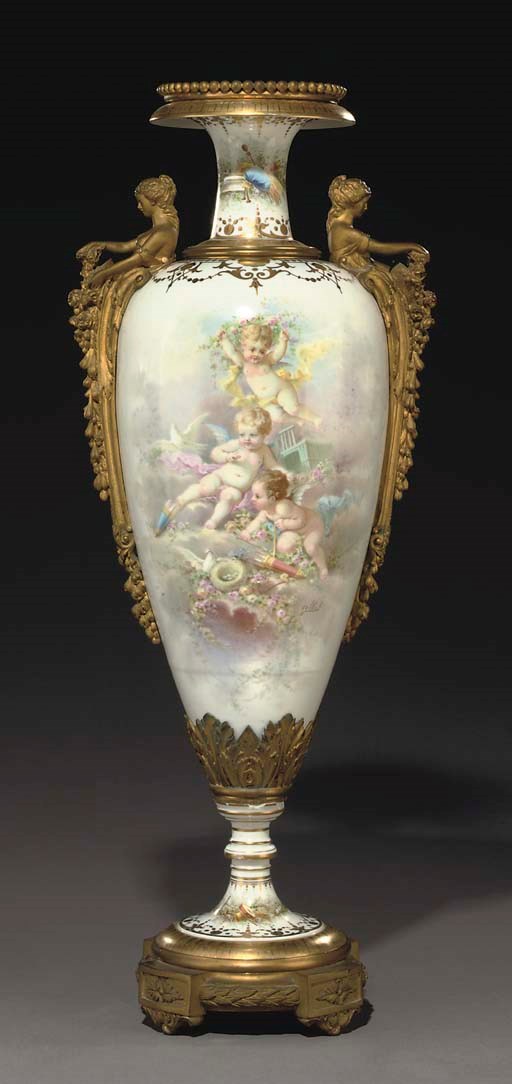 AN ORMOLU-MOUNTED SEVRES STYLE WHITE-GROUND VASE