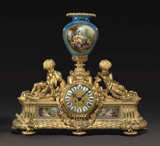 A LARGE FRENCH ORMOLU AND SEVRES STYLE TURQUOISE-GROUND PORCELAIN-MOUNTED MANTEL CLOCK