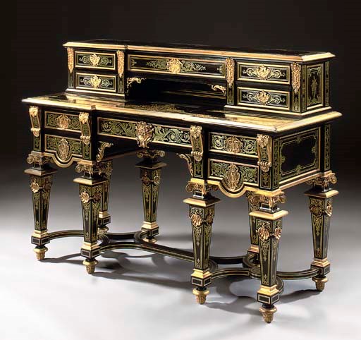 A FINE NAPOLEON III ORMOLU-MOUNTED CUT BRASS AND TORTOISESHELL-INLAID 'BOULLE' AND EBONY BUREAU MAZARIN
