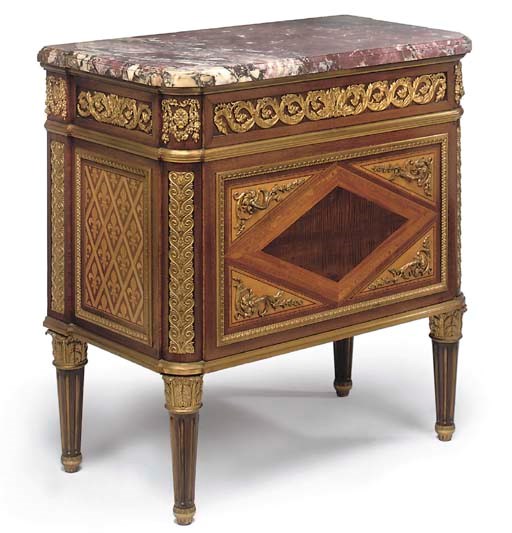 A LOUIS XVI STYLE ORMOLU-MOUNTED AMARANTH, SYCAMORE, HAREWOOD AND PARQUETRY COMMODE