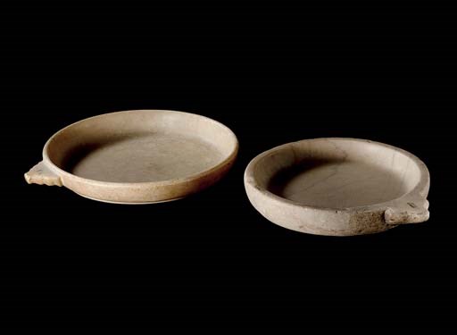 Two shallow marble bowls