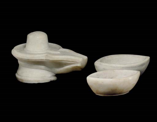 A group of one marble lingam and two marble mortars