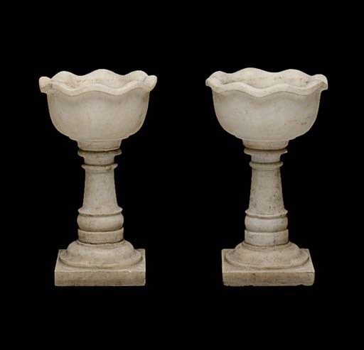 A pair of marble jardinieres