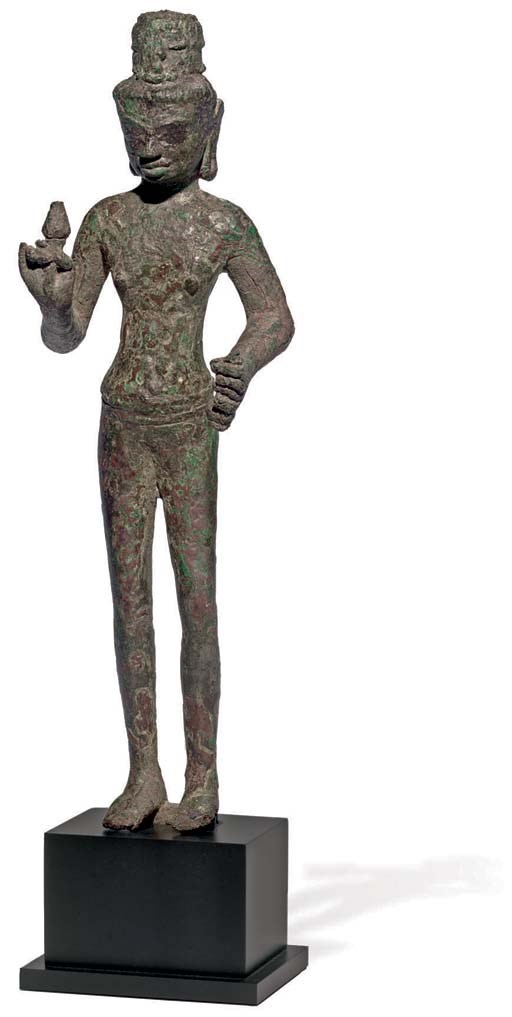 A bronze figure of Maitreya