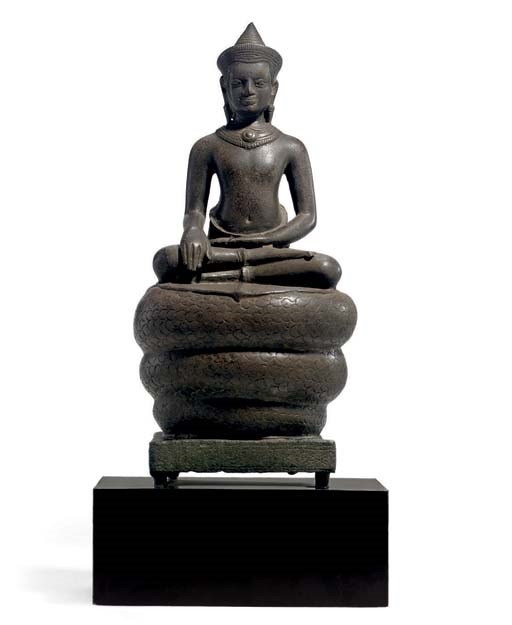 A bronze figure of Buddha Muchalinda