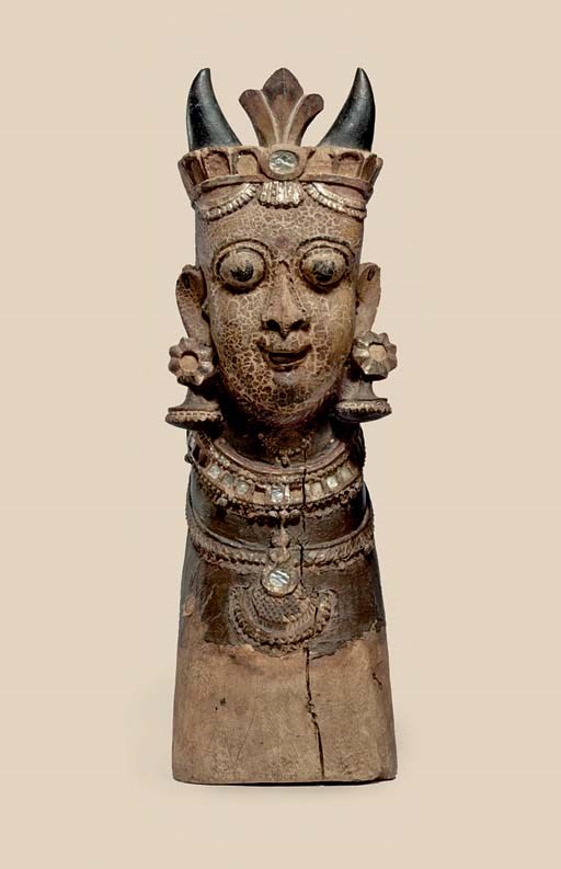 A polychromed wooden bust of Nandi