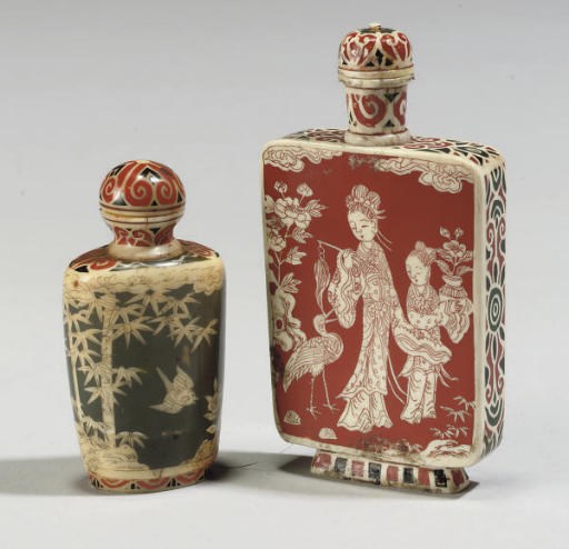 Two Japanese stained ivory snuff bottles, 19th Century