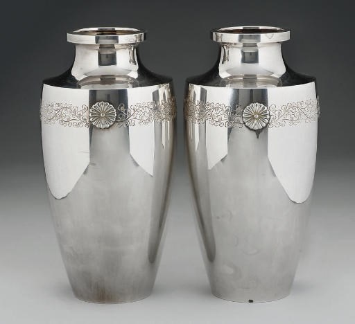 A pair of Japanese ovoid silver vases, Meiji (1868-1912)