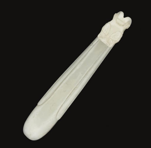 A Chinese white jade belt hook, 19th century