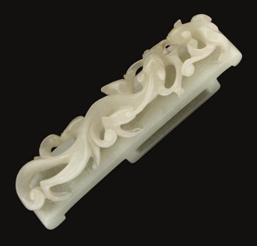 A Chinese pale celadon sword slide, late 18th early 19th century