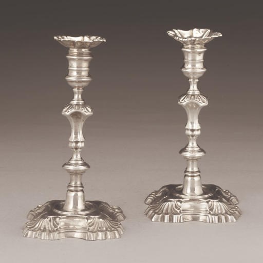 A PAIR OF GEORGE II SILVER CANDLESTICKS