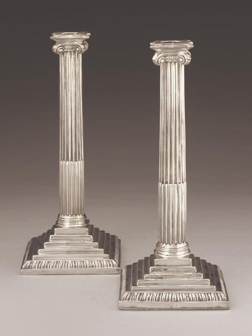 A PAIR OF GEORGE III SILVER CANDLESTICKS