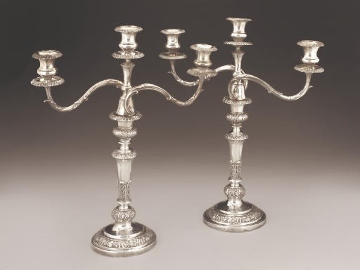 A MATCHED PAIR OF GEORGE III GEORGE IV SILVER CANDELABRA
