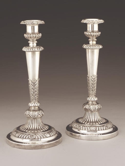 A PAIR OF OLD SHEFFIELD PLATE CANDLESTICKS