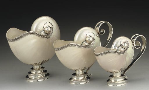 A GROUP OF THREE MODERN AMERICAN METALWARE-MOUNTED NAUTILUS SHELLS,
