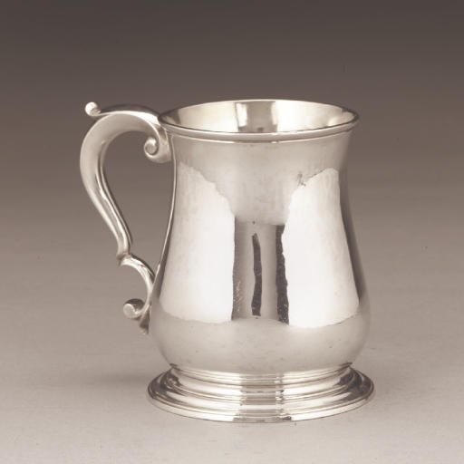 A GEORGE II SILVER MUG OF BALUSTER FORM,