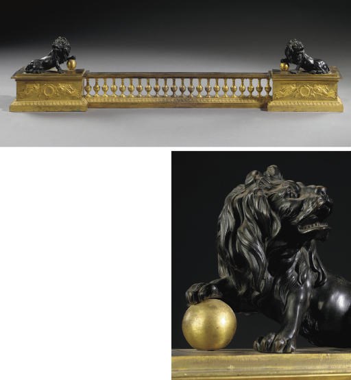 AN EMPIRE ORMOLU AND PATINATED-BRONZE FIRE FENDER