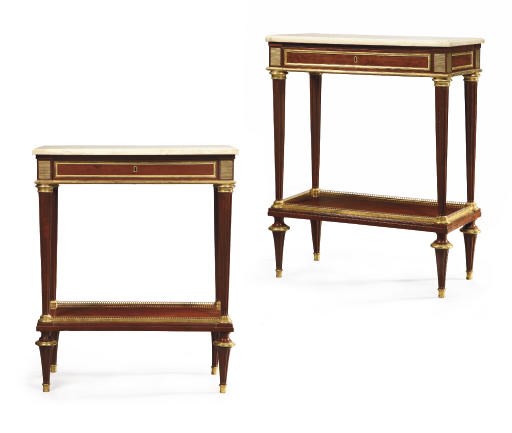 A PAIR OF LOUIS XVI ORMOLU-MOUNTED MAHOGANY CONSOLES