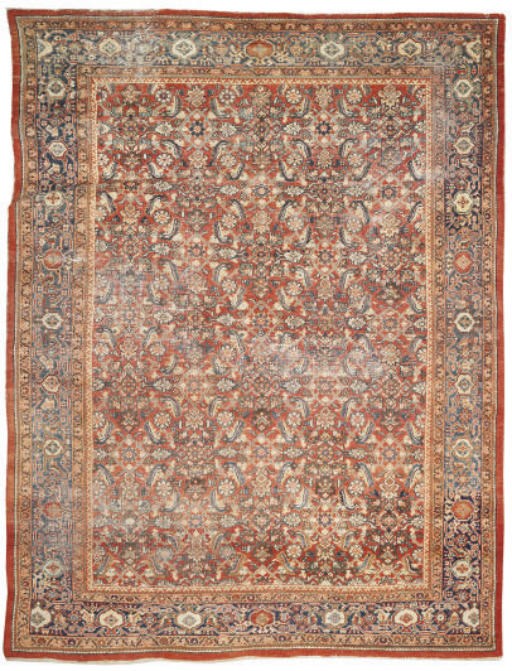 An antique Mahal carpet