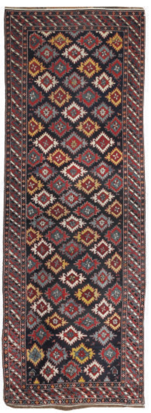 An antique Kuba long rug