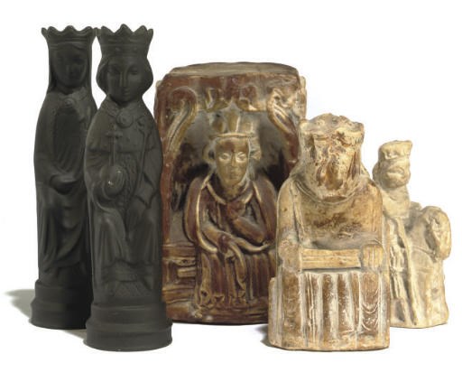 TWO BLACK BASALT CHESS PIECES