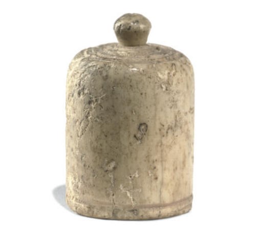 AN AFGHANISTANI BONE OR IVORY CHESS PIECE
