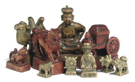 A MONGOLIAN PAINTED CARVED WOOD FIGURAL CHESS SET