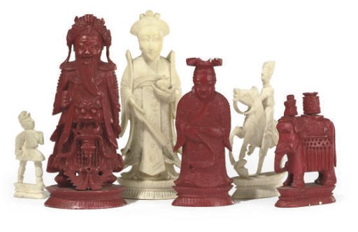 A CHINESE-EXPORT CARVED IVORY FIGURAL SET