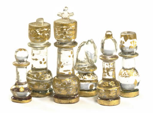 A NORTH INDIAN GILT-HEIGHTENED ROCK CRYSTYAL CHESS SET