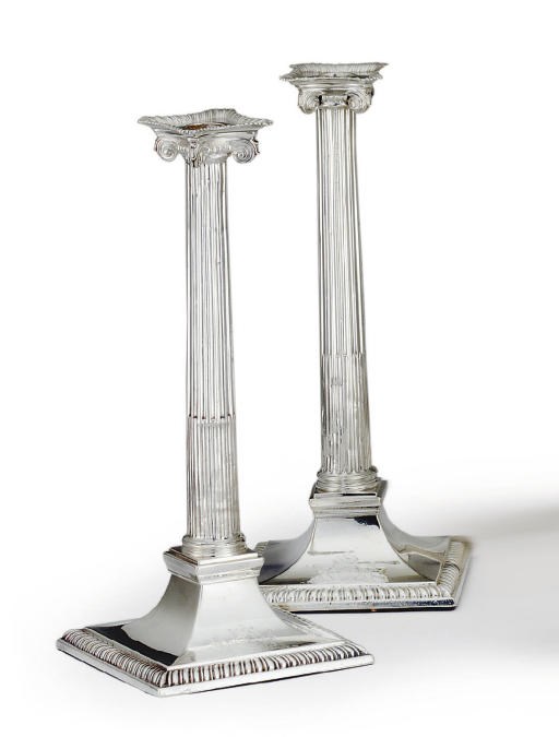 A PAIR OF GEORGE III SILVER CANDLESTICKS