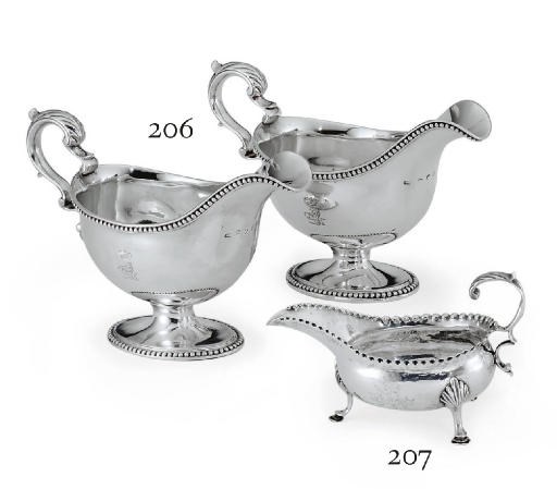 A GEORGE III SILVER CREAM BOAT