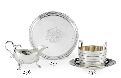 A GEORGE III IRISH SILVER BUTTER TUB AND STAND