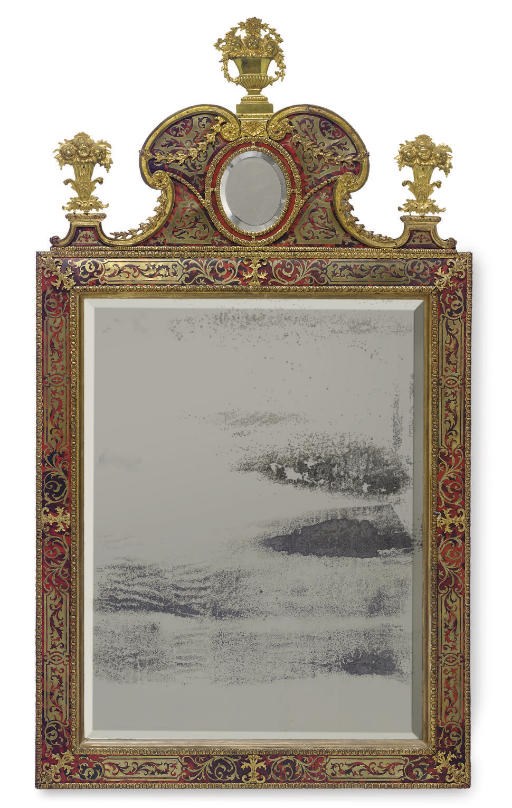 A NAPOLEON III ORMOLU-MOUNTED, CUT BRASS AND TORTOISESHELL-INLAID EBONISED 'BOULLE' MIRROR**