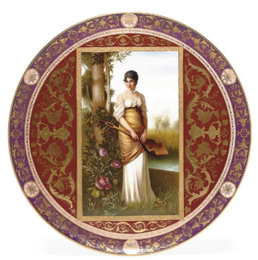 A VIENNA STYLE (HASS & CZJZEK) CLARET AND MAGENTA GROUND PORTRAIT CHARGER, 'DIE LAUTENSCHLÄGERIN'